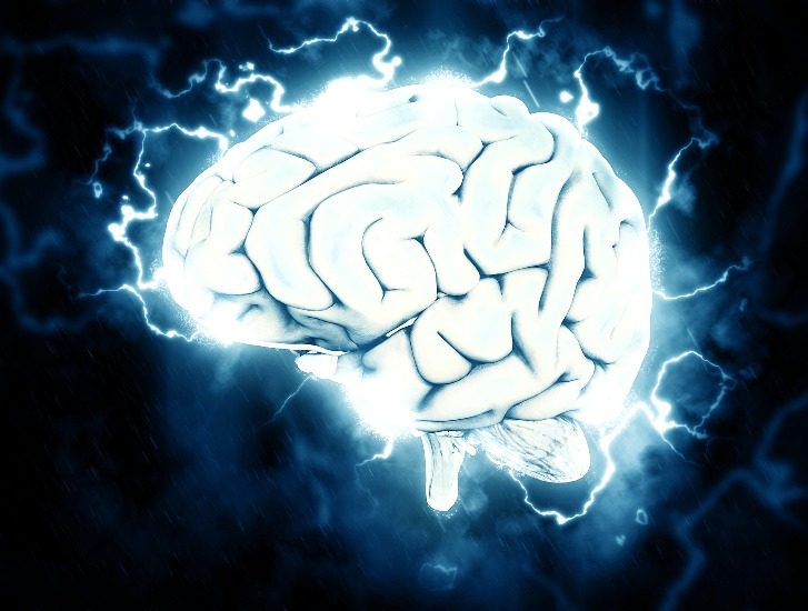 Un cerveau entouré de lumières. Un cerveau entouré de lumières.